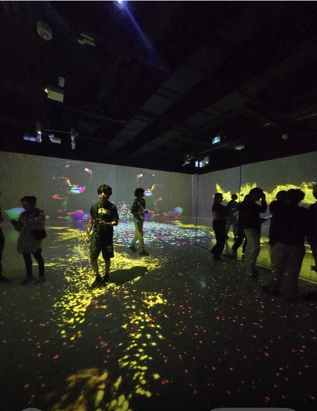 Photo of Chaminade students at Arcadia Earth exploring an exhibit
