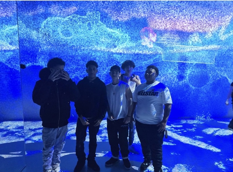 Photo of Chaminade students at Arcadia Earth exploring an exhibit