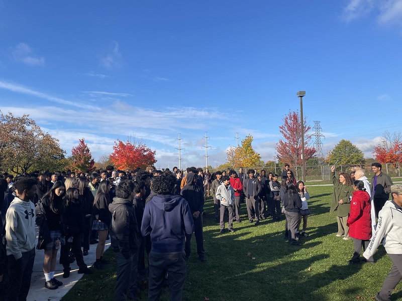 Photo of SJPII students and staff out on the school grounds