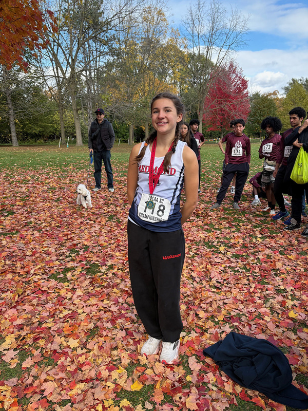 Photo of Father John Redmond student with her winning medal
