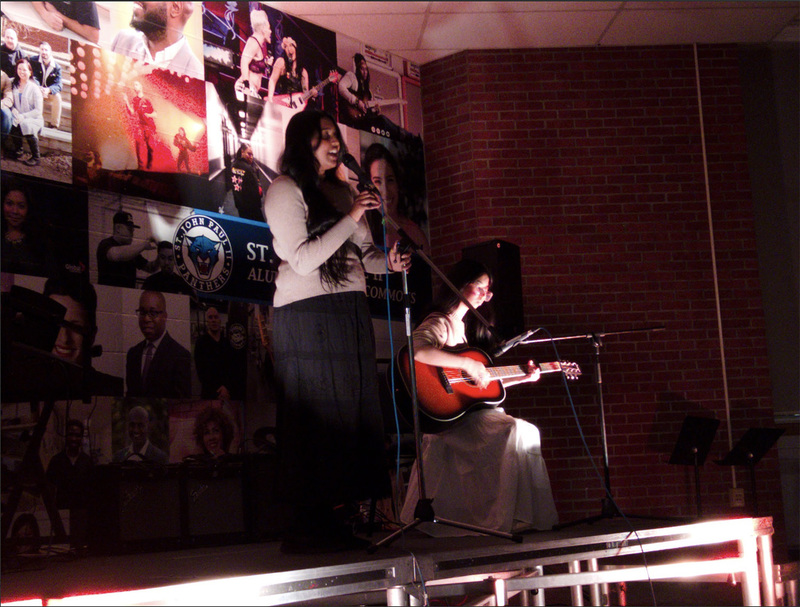 Photo of St. John Paul II students performing at the Coffeehouse