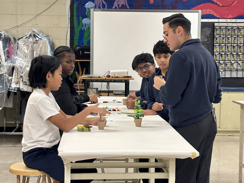 Elementary students attend presentation by high school students during Francis Libermann’s Take Our Kids to High School Day