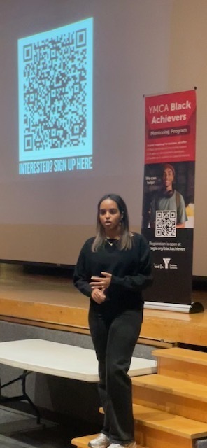 Photo of a presenter presenting during the information session