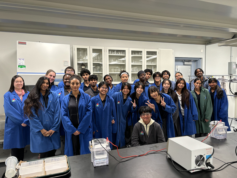Group photo of SJOA students in a Toronto Metropolitan University (TMU) lab during the event