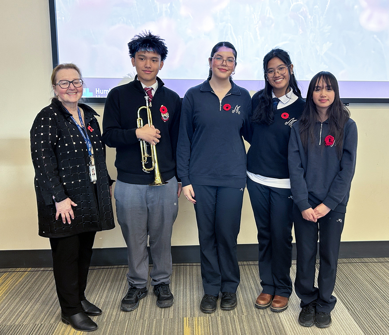 Group photo of the participating Madonna and Brebeuf students along with a TCDSB staff member