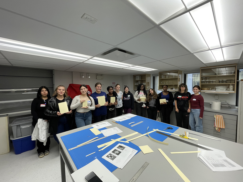 Photo of Loretto College School students showing off their work