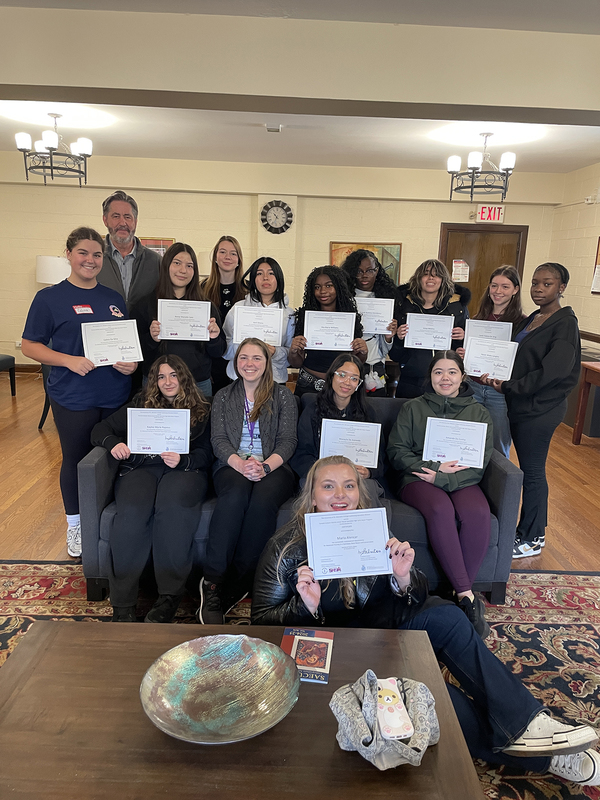 Group photo of Loretto College School students with their certificates