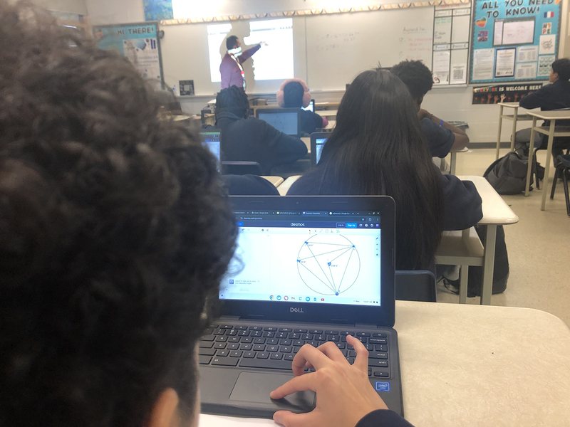 Photo of Father Henry Carr students working on the sessions in math class