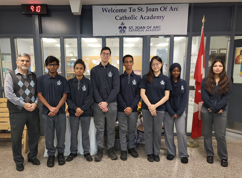 Group photo of SJOA students who took the test, along with the head of the Math department