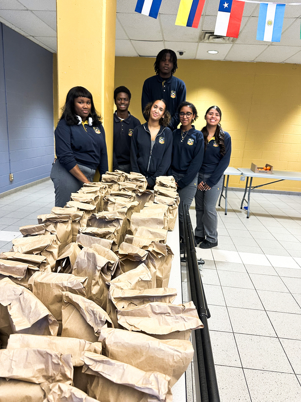 Photo of St. Basil-the-Great students with the lunches they prepared