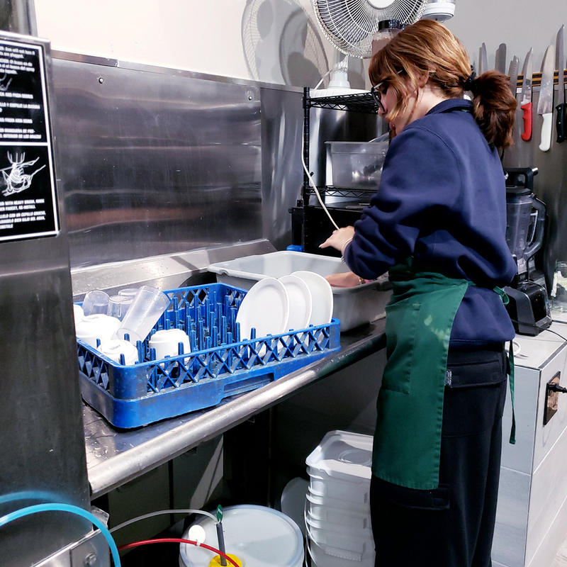 Photo of Loretto College students working at St. Francis Table