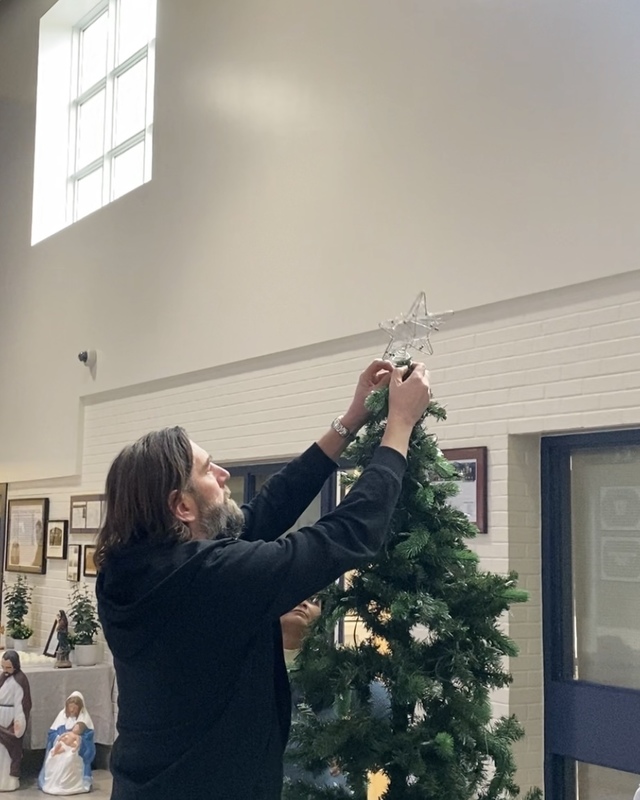 Photo of Father Henry Carr staff