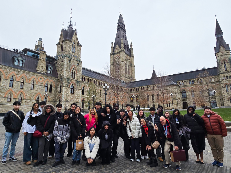 Group photo of St. Oscar Romero students and staff in front of the Canadian parliament