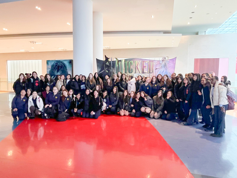 Group photo of Loretto College students and staff before the Wicked: For Good screening