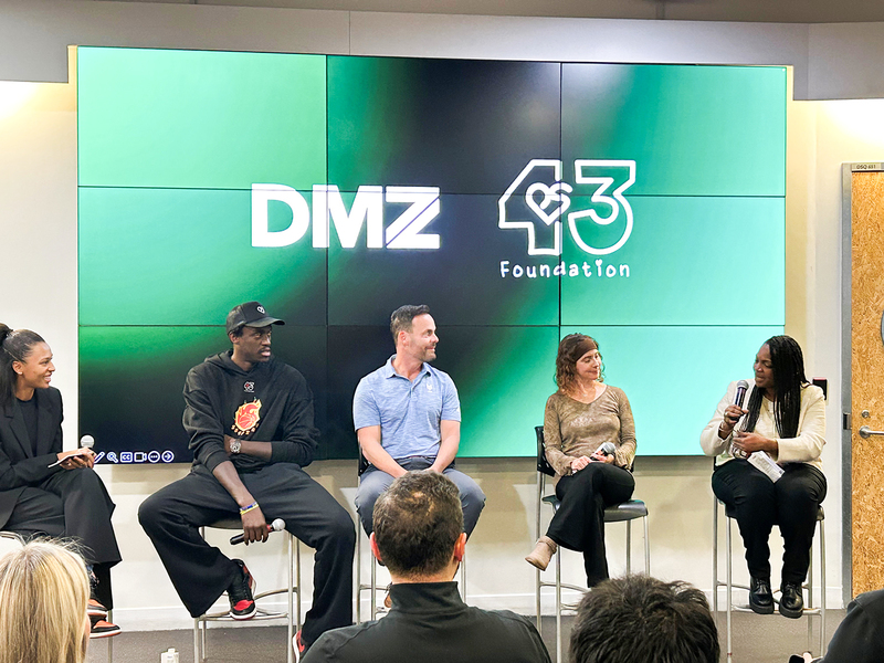 Photo of Principal Lorraine Van Zon of Bishop Macdonell Catholic Elementary School on stage with former Toronto Raptor and NBA All-Star Pascal Siakam, Dakota Whyte — Executive Director of the PS43 Foundation, James Hayes of Cyber Legends, and Erica Derrickson of English Islands at an exclusive event hosted at Toronto Metropolitan University’s DMZ