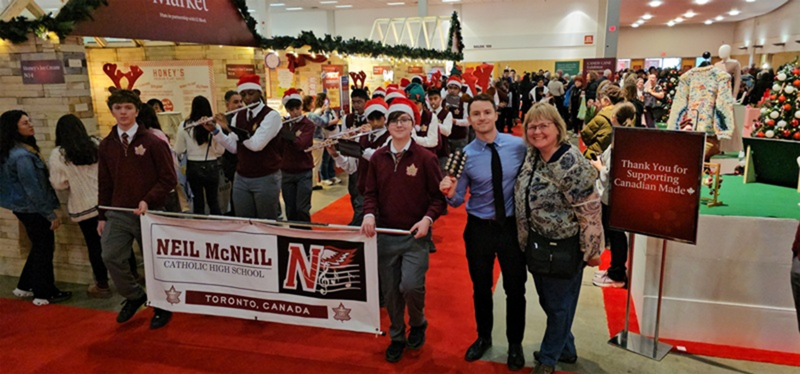 Photo of Neil McNeil Marching Band students performing at the show