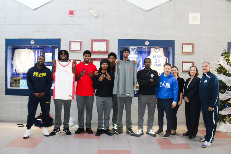 Group photo of Father Henry Carr students, staff and MLSE staff