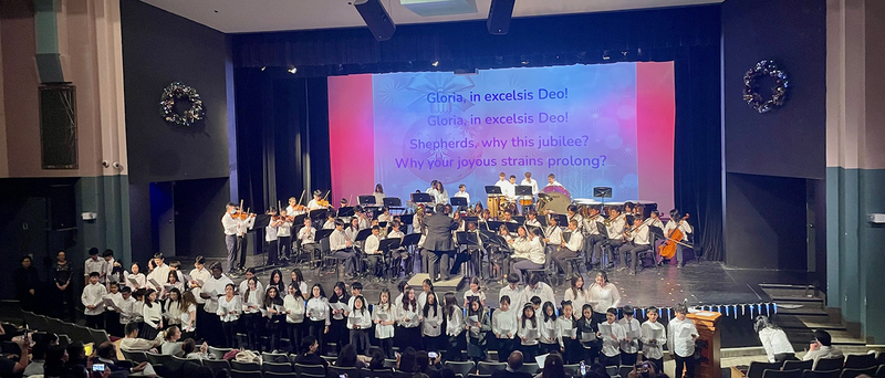 Group photo of TCDSB music students performing