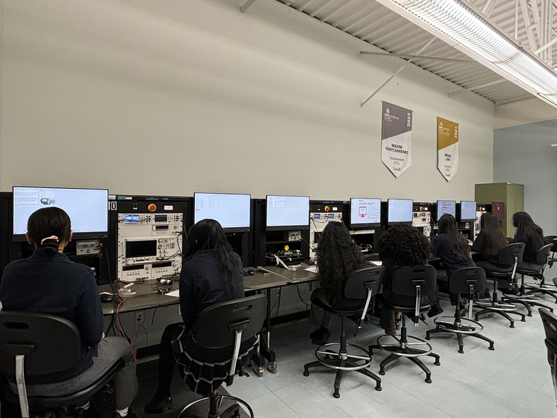 Photo of two SJOA students exploring Health and Wellness technology at Seneca