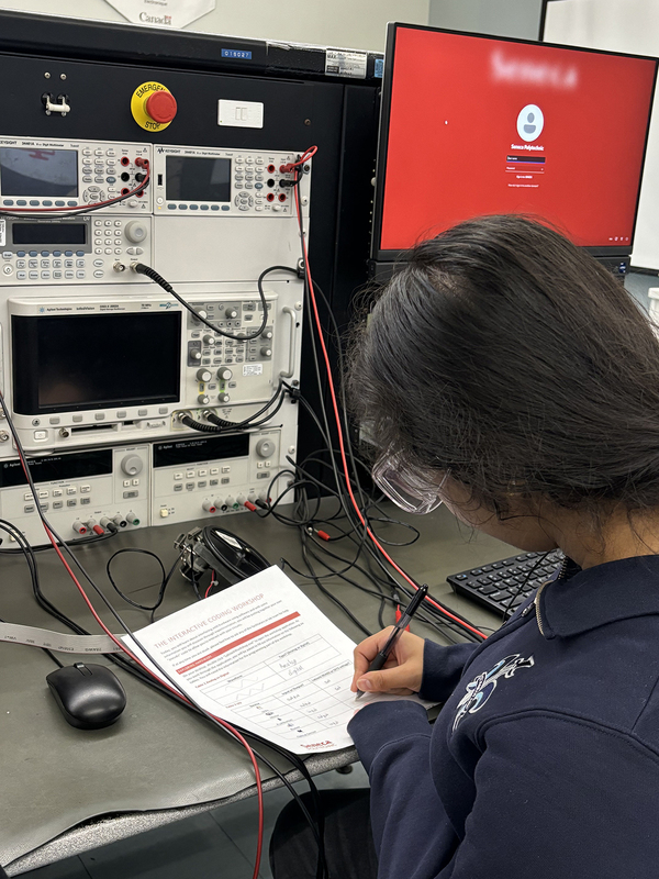 Photo of two SJOA students exploring Health and Wellness technology at Seneca