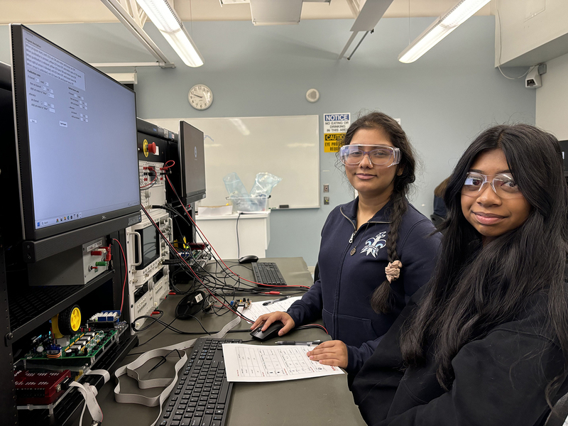 Photo of two SJOA students exploring Health and Wellness technology at Seneca