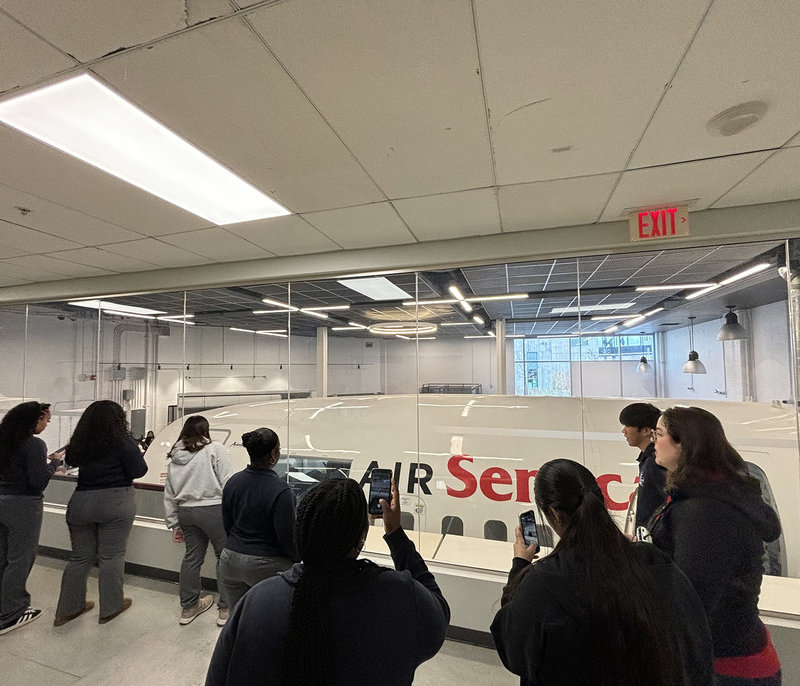 Photo of two SJOA students exploring Health and Wellness technology at Seneca