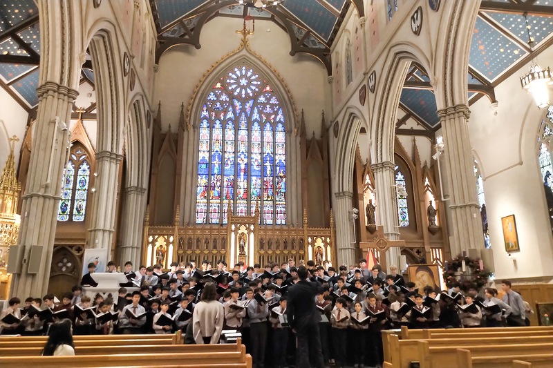 Photo of SJOA students and staff in chapel