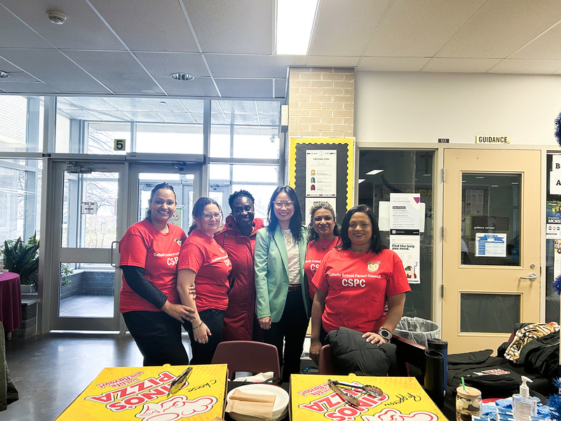 Photo of pizza vendors at the market with the school principal