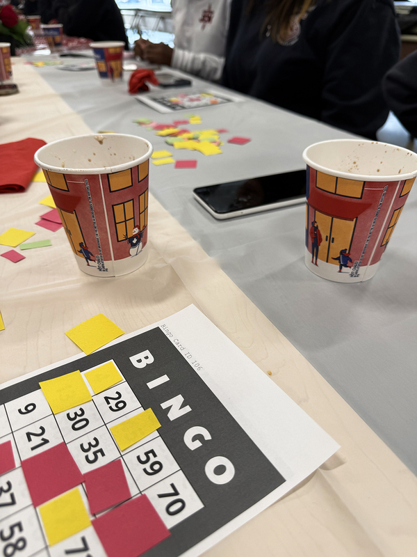 Photo of drink cups and bingo sheets