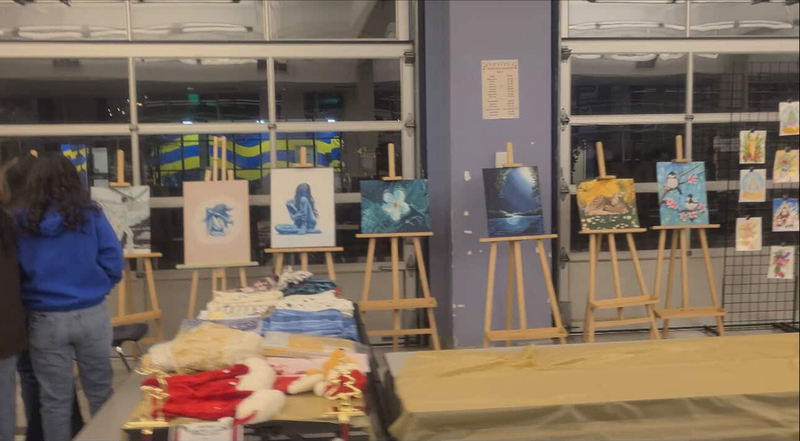 Photo of the art on display on easels