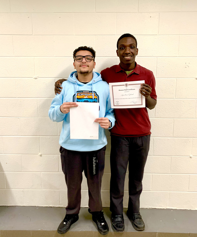 Photo of St. Oscar Romero students with their achievement certificates