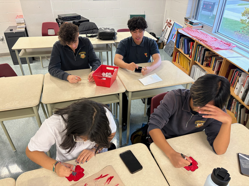 Photo of MPJ students making the poppies