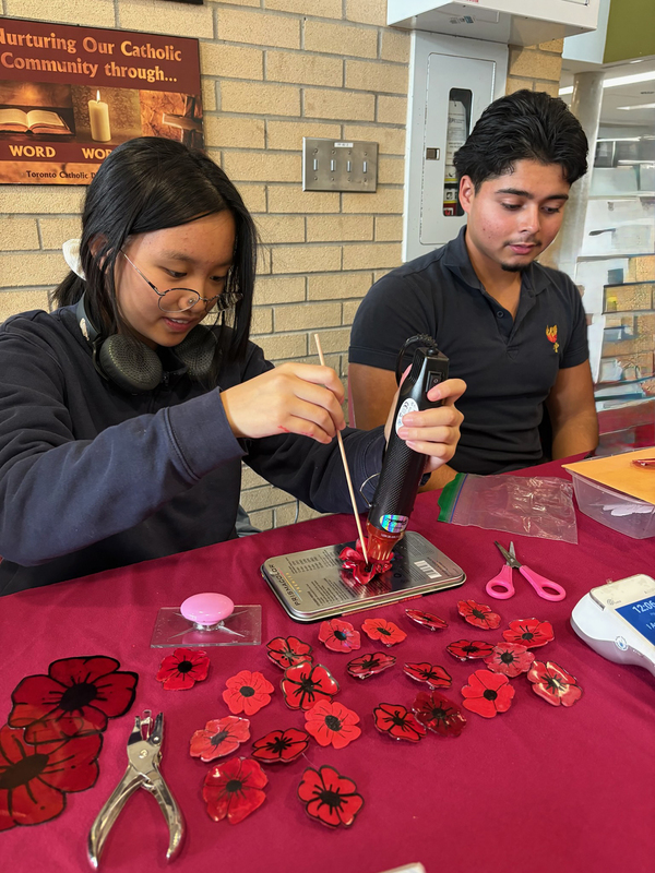 Photo of MPJ students making the poppies
