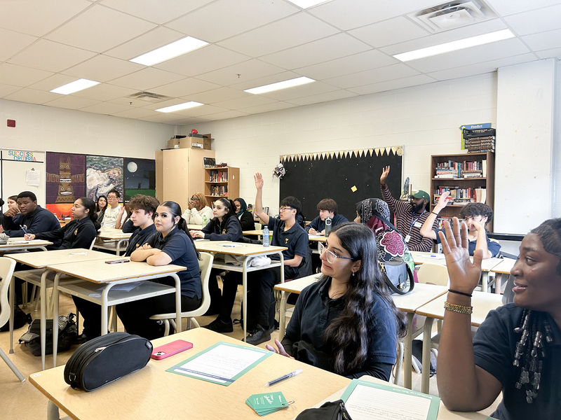 Photo of students working in class under the direction of the career coaches