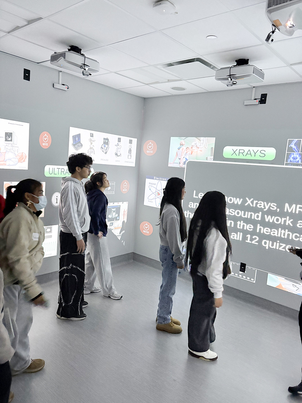 Photo of students in an interactive surround display