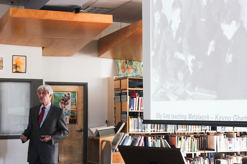 Photo of Elly speaking to St. Oscar Romero students