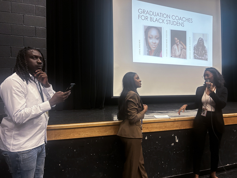 Photo of the three Black Graduation coaches introducing the event