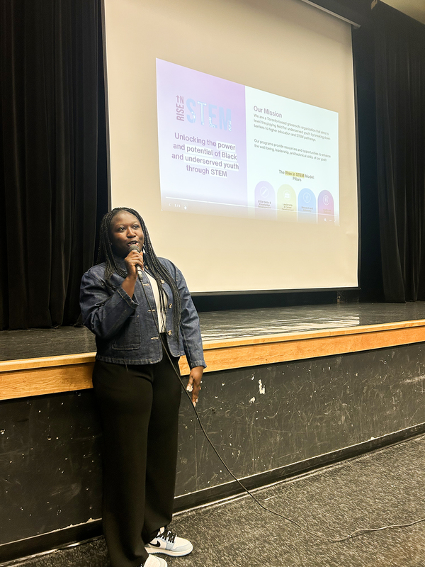 Photo of speakers presenting during the event