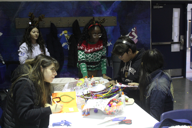 Photo of attendees at Father Henry Carr's Christmas in the Courtyard celebration
