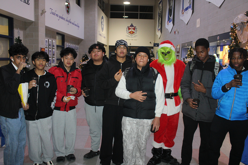 Photo of attendees at Father Henry Carr's Christmas in the Courtyard celebration