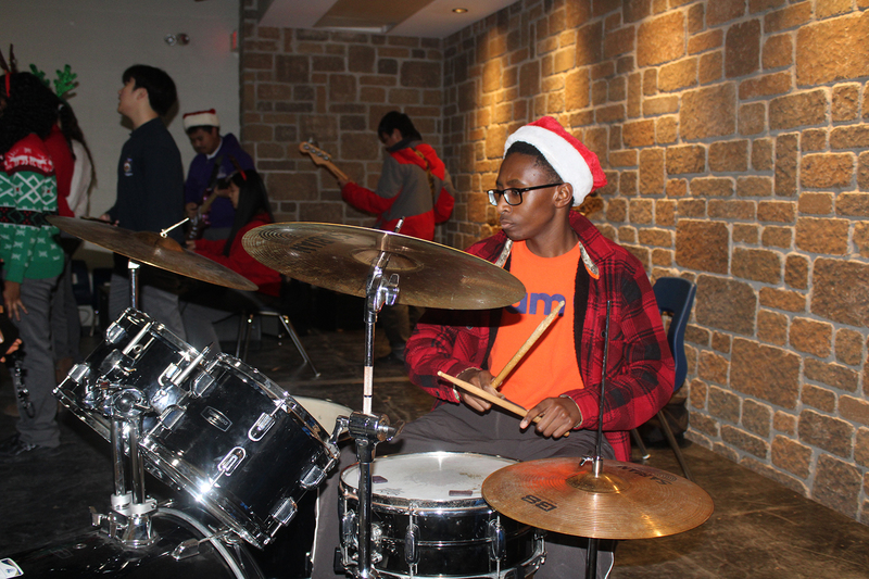 Photo of attendees at Father Henry Carr's Christmas in the Courtyard celebration