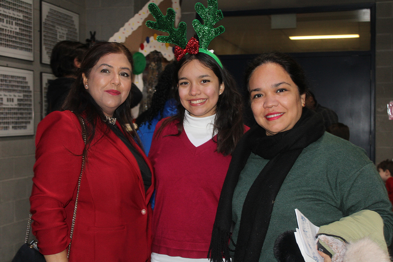 Photo of attendees at Father Henry Carr's Christmas in the Courtyard celebration