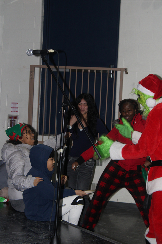 Photo of attendees at Father Henry Carr's Christmas in the Courtyard celebration