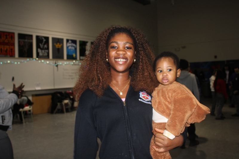 Photo of attendees at Father Henry Carr's Christmas in the Courtyard celebration