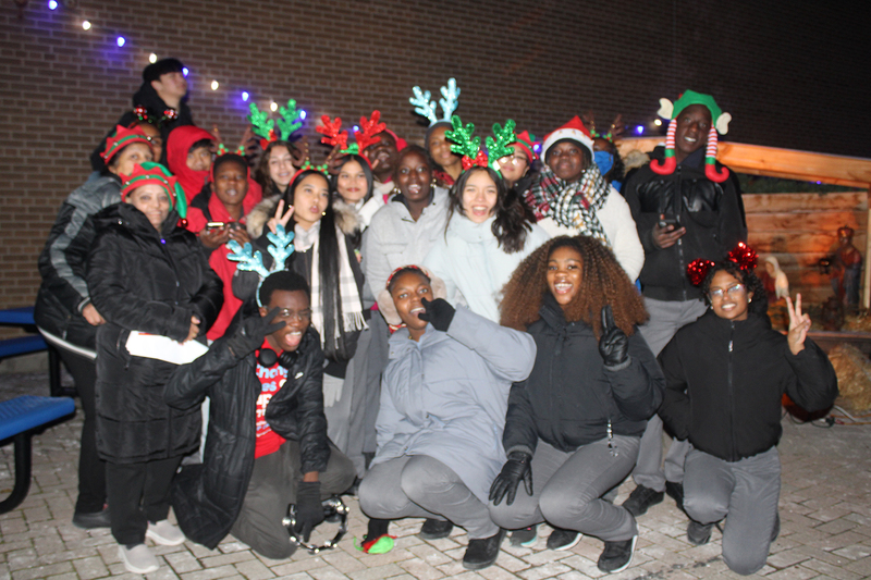 Photo of attendees at Father Henry Carr's Christmas in the Courtyard celebration
