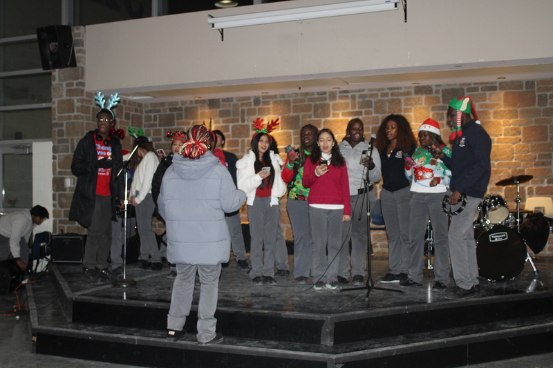 Photo of attendees at Father Henry Carr's Christmas in the Courtyard celebration