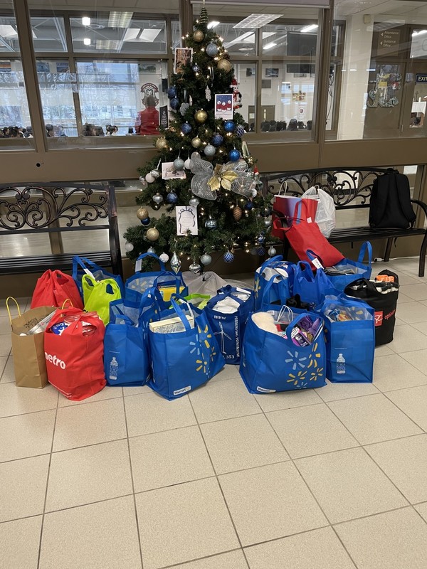 JCM Staff Share the Spirit of Advent Through Christmas Bag Initiative