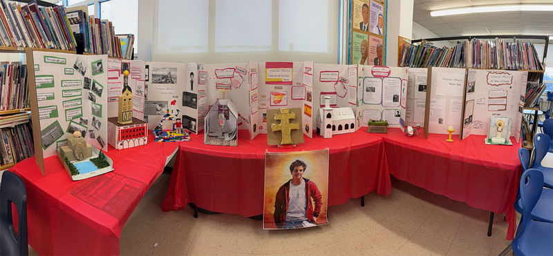 Photo of all the displays made by students on Saint Carlo Acutis