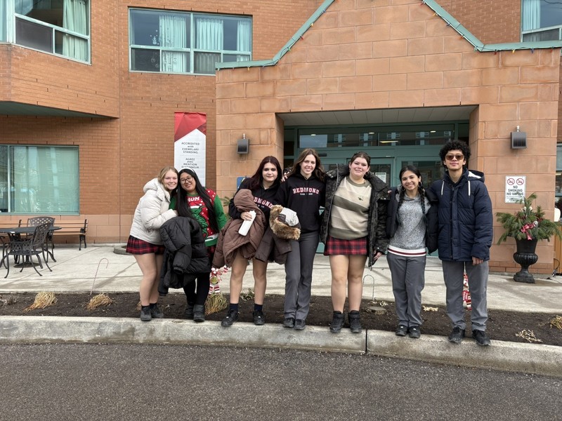 Father John Redmond Students Share Christmas Cheer at Lakeshore Lodge