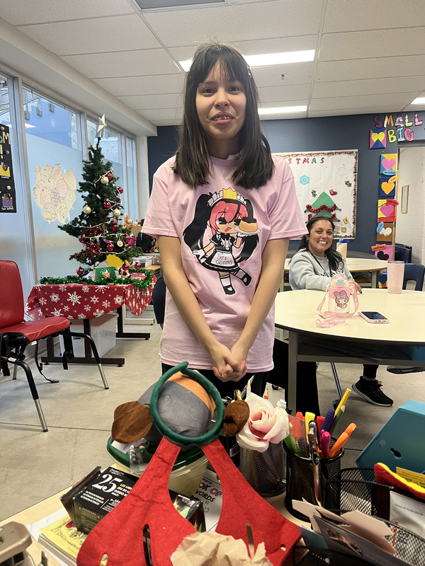 Photo of one of the students and staff in class